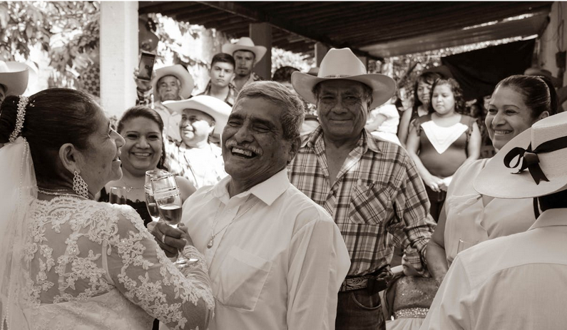 Elderly Mexican couple tying the knot